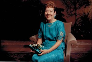 My mom in a turquoise dress at my wedding to Eliz in 1990.